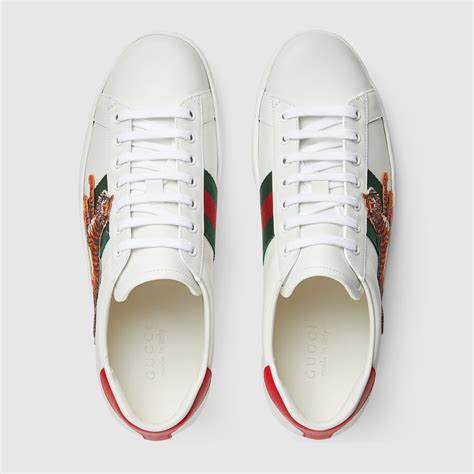 gucci heart dagger sneakers|Gucci ace tiger sneakers.